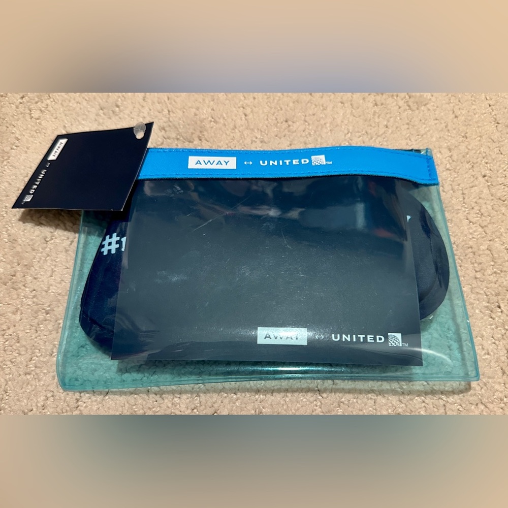New With Tag Away United Polaris Amenities Kit, Light Blue, with Amenities.